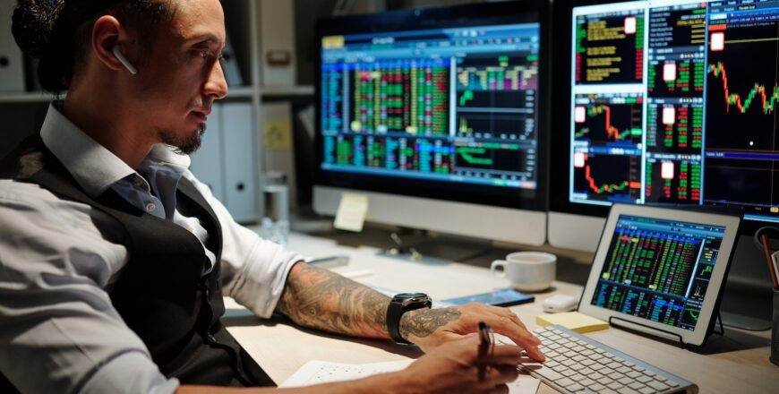 Broker reviewing trades